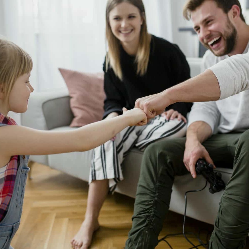 family-bumping-fists